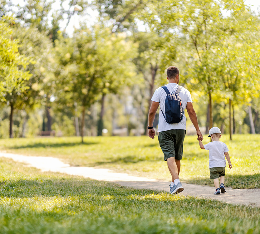 father and son at park